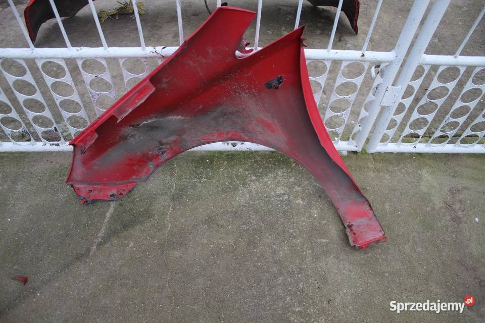 BŁOTNIK PRAWY OPEL CORSA D Z547