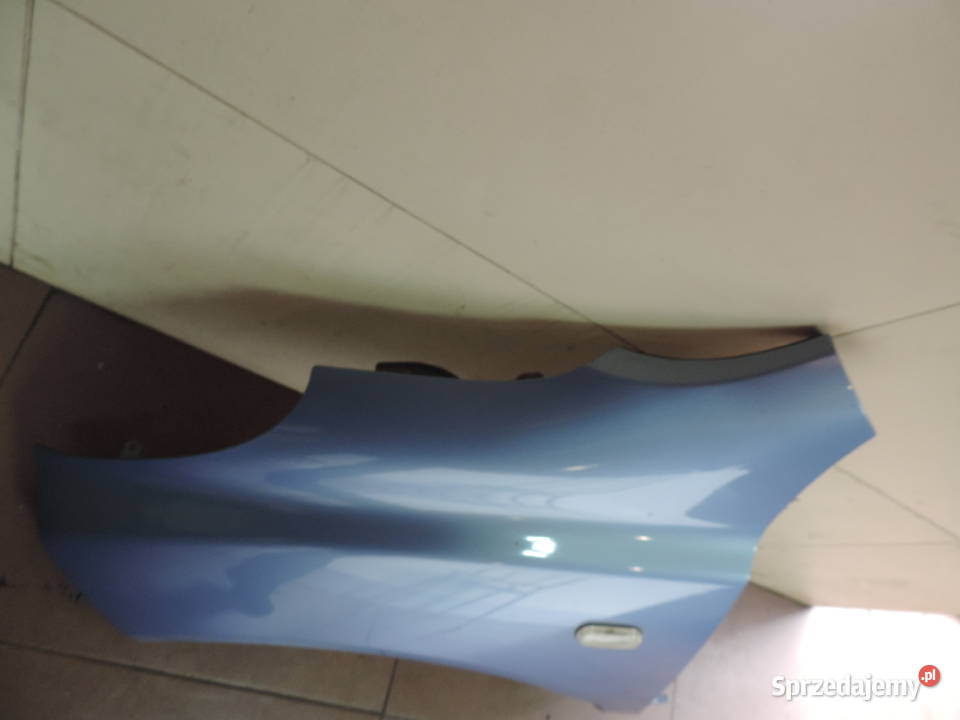 NISSAN MICRA K12 BŁOTNIK LEWY PRZÓD T12G Nowy Sącz