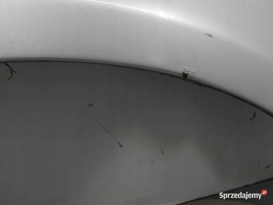 BŁOTNIK PRAWY PRZÓD SREBRNY VW Volkswagen Touran