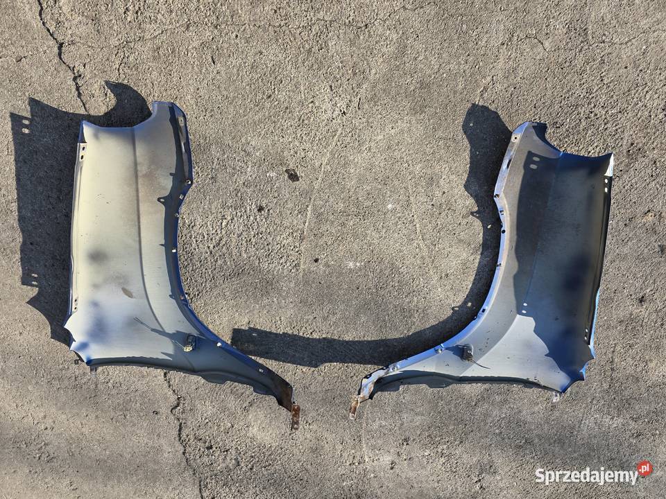 Suzuki Ignis FH 0003 błotnik błotniki przednie osobowe Legnica