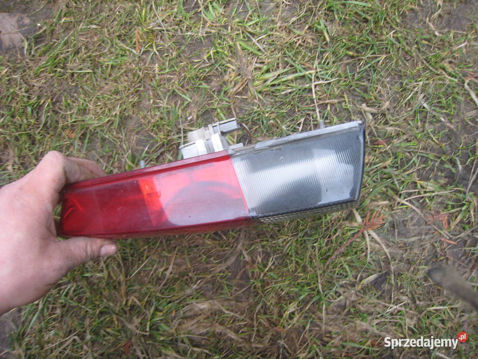 Lampa tylna lewa w klapę Audi 80 B4 sedan 9094 Kraków