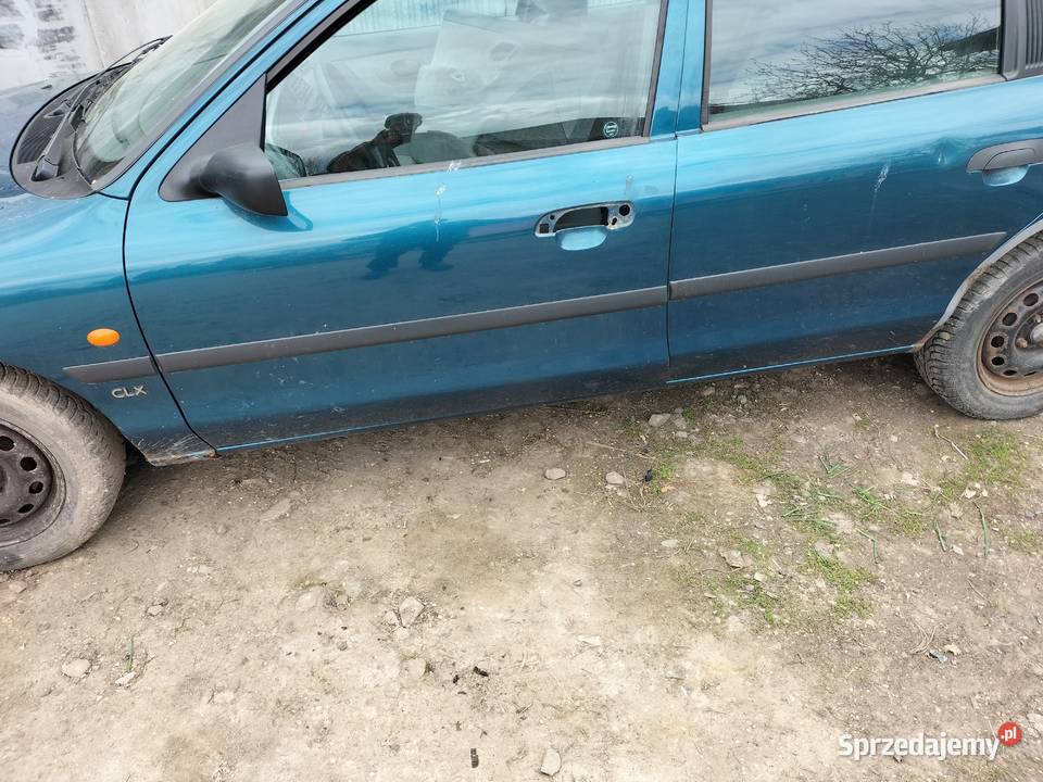 LISTWY LISTWA BOCZNE BŁOTNIKA DRZWI FORD MONDEO Kamień-Kolonia