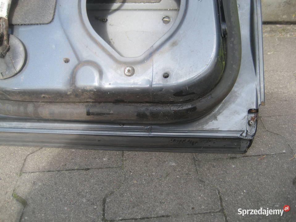 audi a4 b6 sedan małysz 0104r drzwi tył lewe Rakoniewice sprzedam