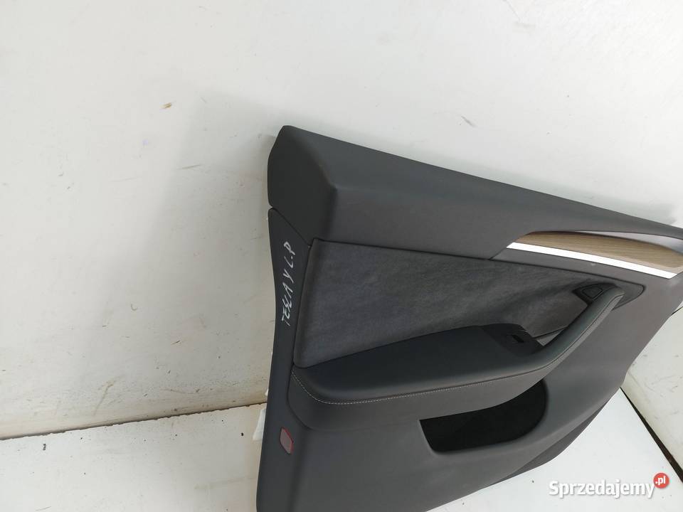 TESLA MODEL Y 2024r TAPICERKA BOCZEK DRZWI LEWY osobowe