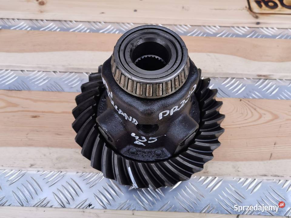 Wałek ataku Koło talerzowe Holland LM 435 Spicer