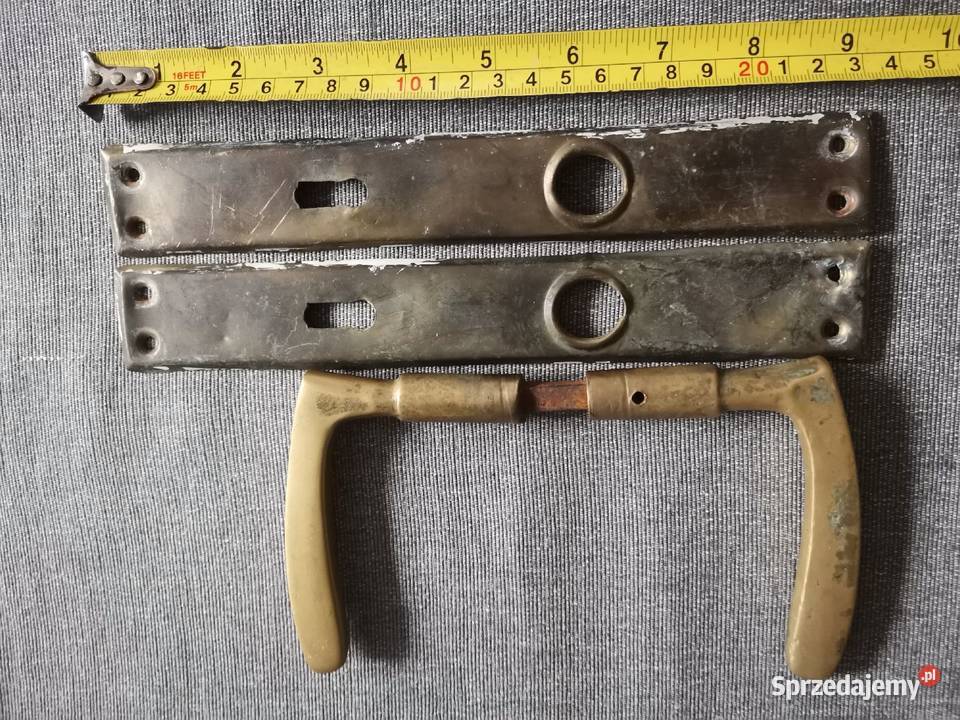 Stara przedwojenna mosiężna klamka szyldy