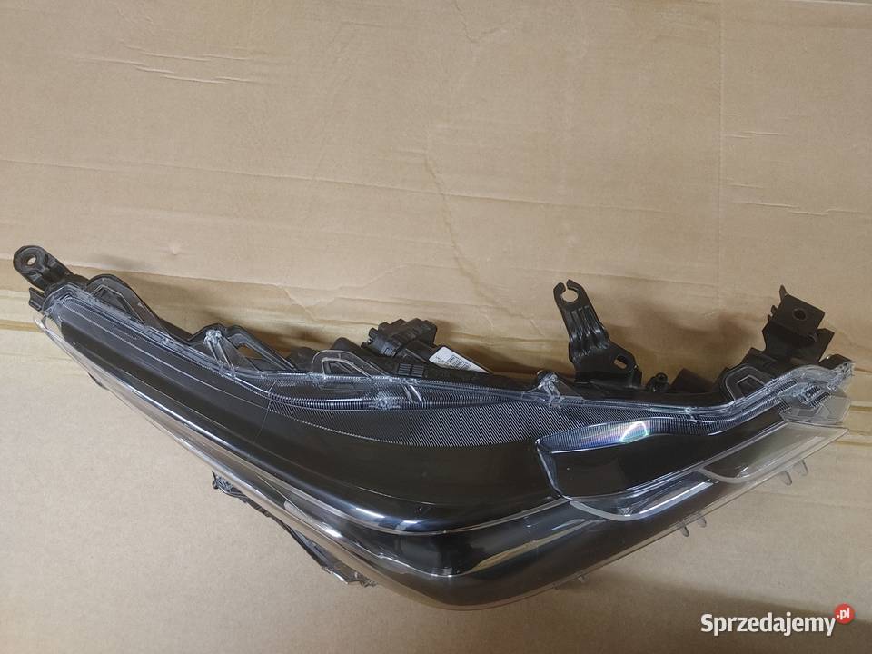 PRAWA LAMPA PRZEDNIA TOYOTA COROLLA XII E21