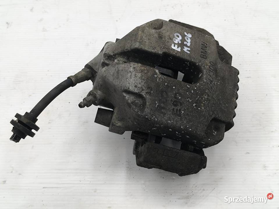 ZACISK LEWY PRZÓD BMW E90 wielkopolskie