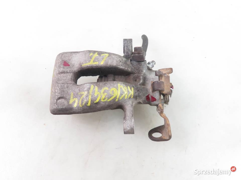 ZACISK LEWY TYŁ OPEL ASTRA III H GTC