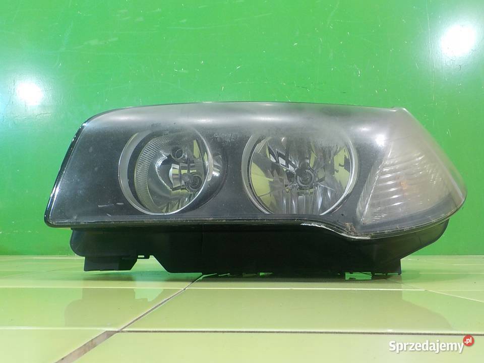 BMW X3 E83 20 D LIFT 07r 5D lampa lewa przod Suków