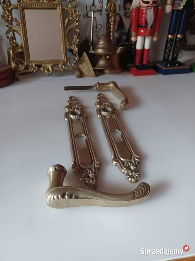 Mosiężne klamki z szyldami Poznań