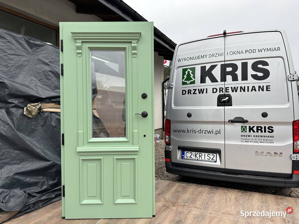 Drzwi drewniane zewnętrzne z klamką schlage Grzybno