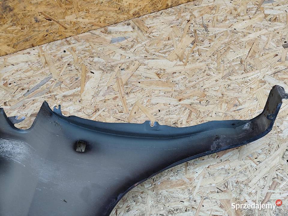 BŁOTNIK PRAWY PRZÓD PRZEDNI OPEL CORSA D 0611R Przemęt