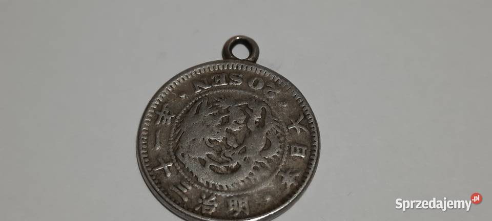moneta Japonia 20 senów 18731905 przerobiona na Warszawa