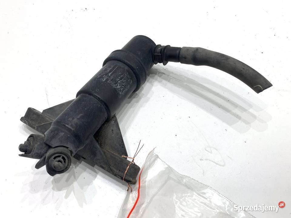 SPRYSKIWACZ REFLEKTORA LEWY PRZÓD BMW E61 Kombi