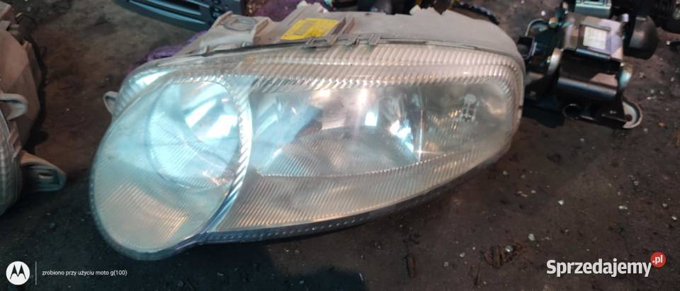 Reflektor lampa lewa prawa przód przednia Alfa Książ Wielkopolski