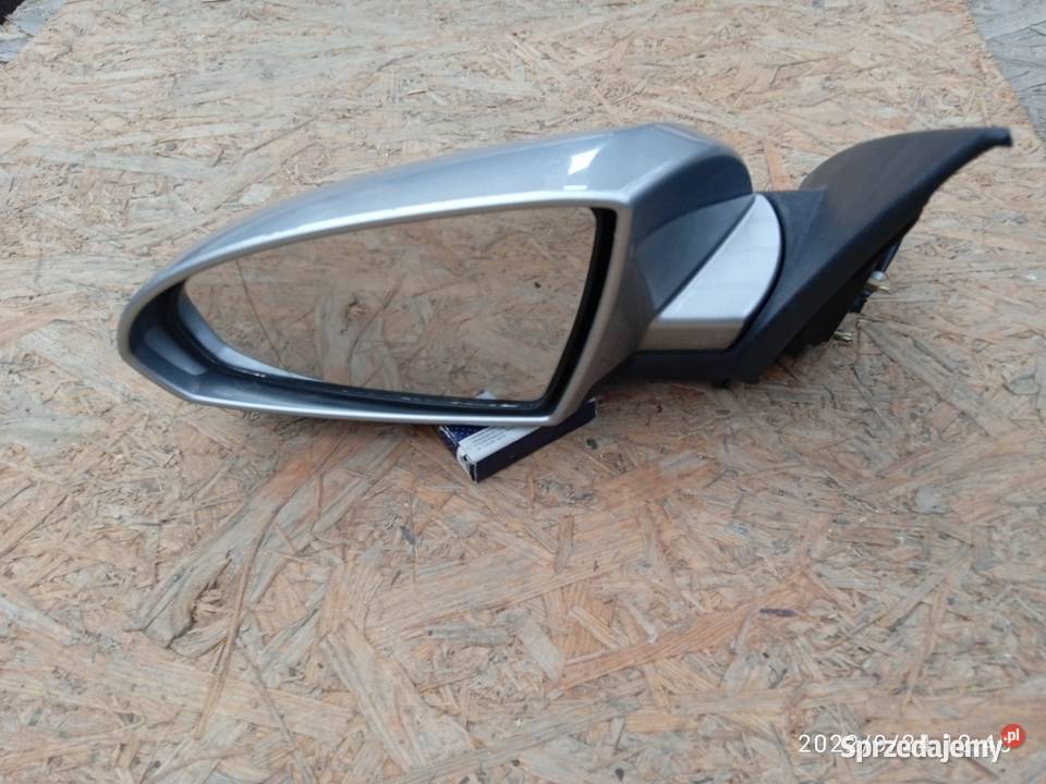 Nissan Primera P12lusterko lewe orginal srebrne