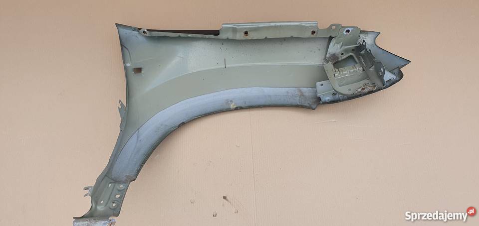 DACIA DUSTER BŁOTNIK LEWY PRZÓD