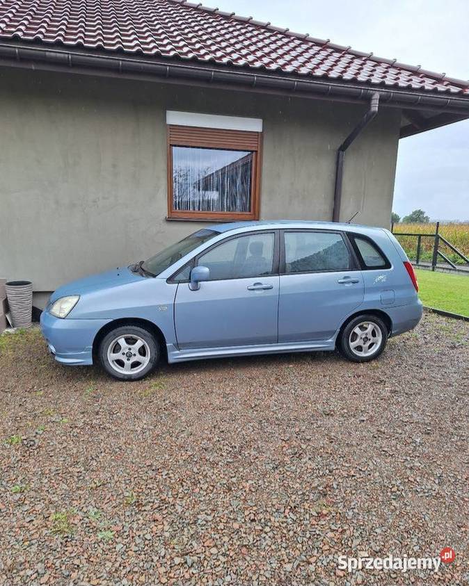 Suzuki Liana 13 benzyna aluminiowe felgi małopolskie sprzedam