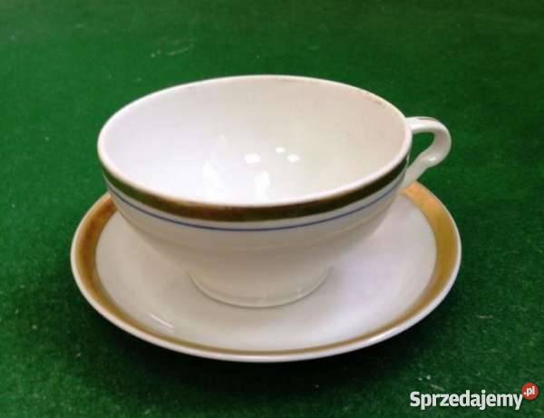 Zestaw białych filiżanek cukiernica i mlecznik