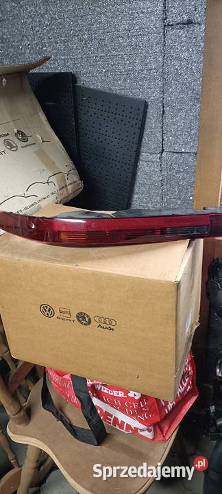 AUDI Q7 4M LAMPA W ZDERZAK TYŁ LEWA 4M0945095 osobowe Oświetlenie Luzino