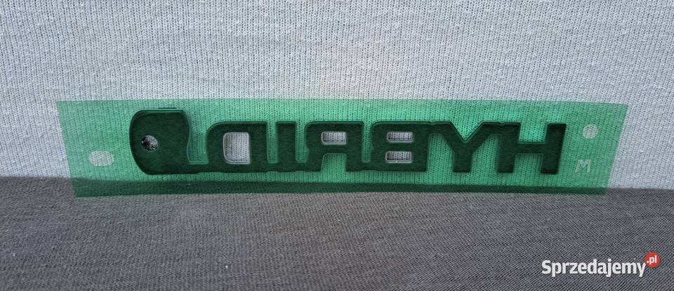7544106100 emblemat napis HYBRID klapy Toyota Emblematy Mielęcin