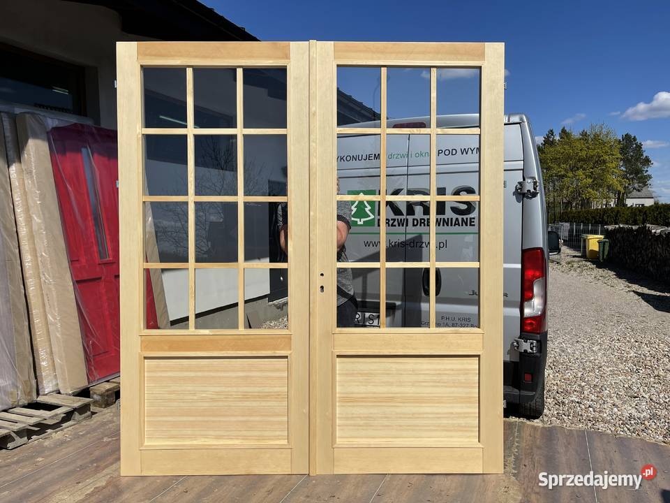 Drzwi zewnętrzne drewniane z doświetlami w Grzybno