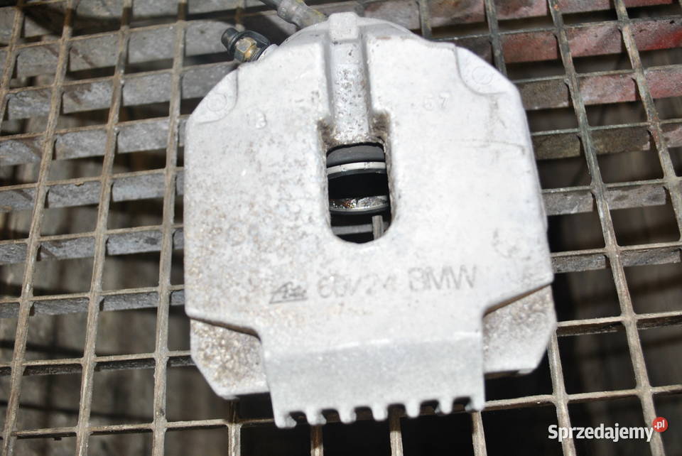 Zacisk hamulcowy lewy przód BMW E60 E61