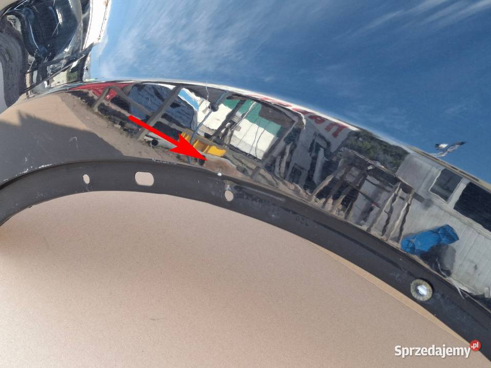 VW TOUAREG II BŁOTNIK LEWY PRZÓD ORYGINAŁ LC9X osobowe Bieleń