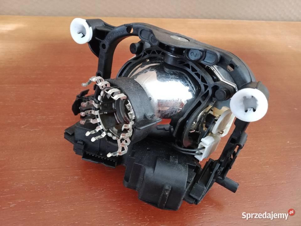 Soczewka skrętna lampy reflektora VW PASSAT B7 Rok produkcji 2011 Przystajń