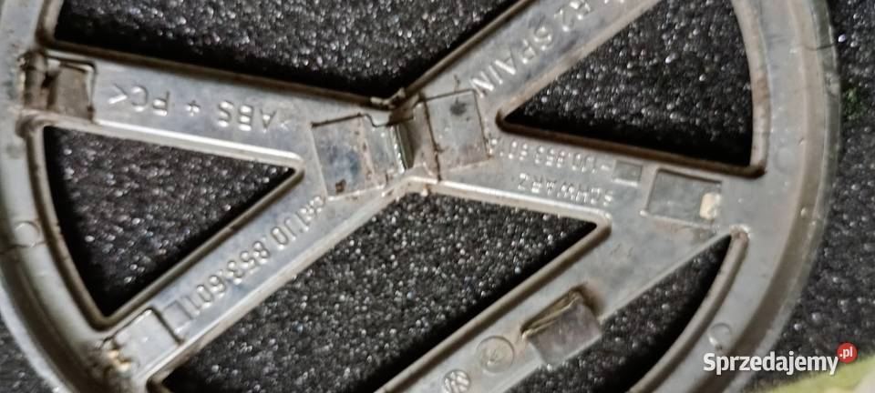 1J0853601 Emblemat znaczek przód VW Golf lV Iłownica