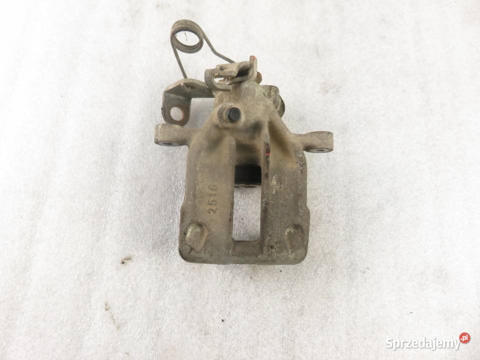 ZACISK LEWY TYŁ AUDI A6 C4 25 TDI sprzedam