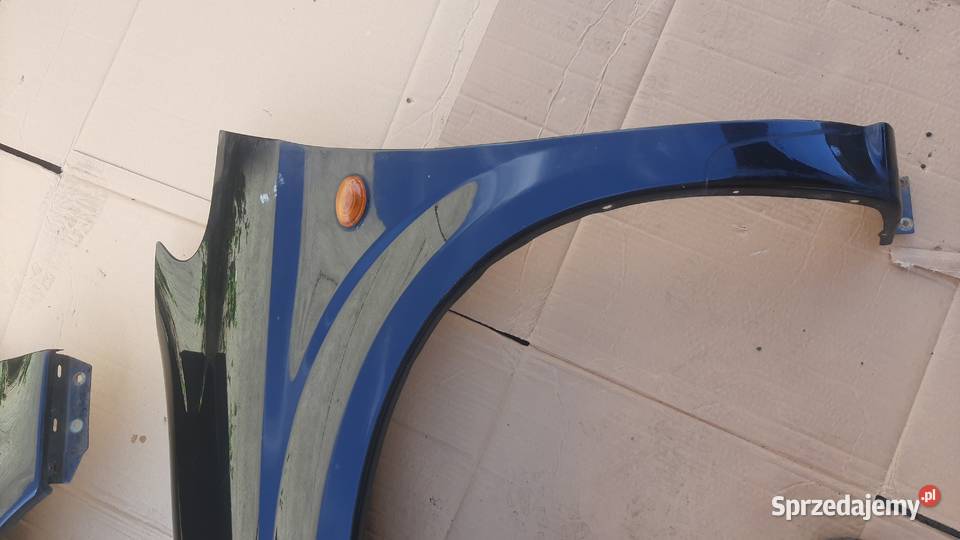 błotnik prawy lewy Chrysler Voyager IV czarny Dębno