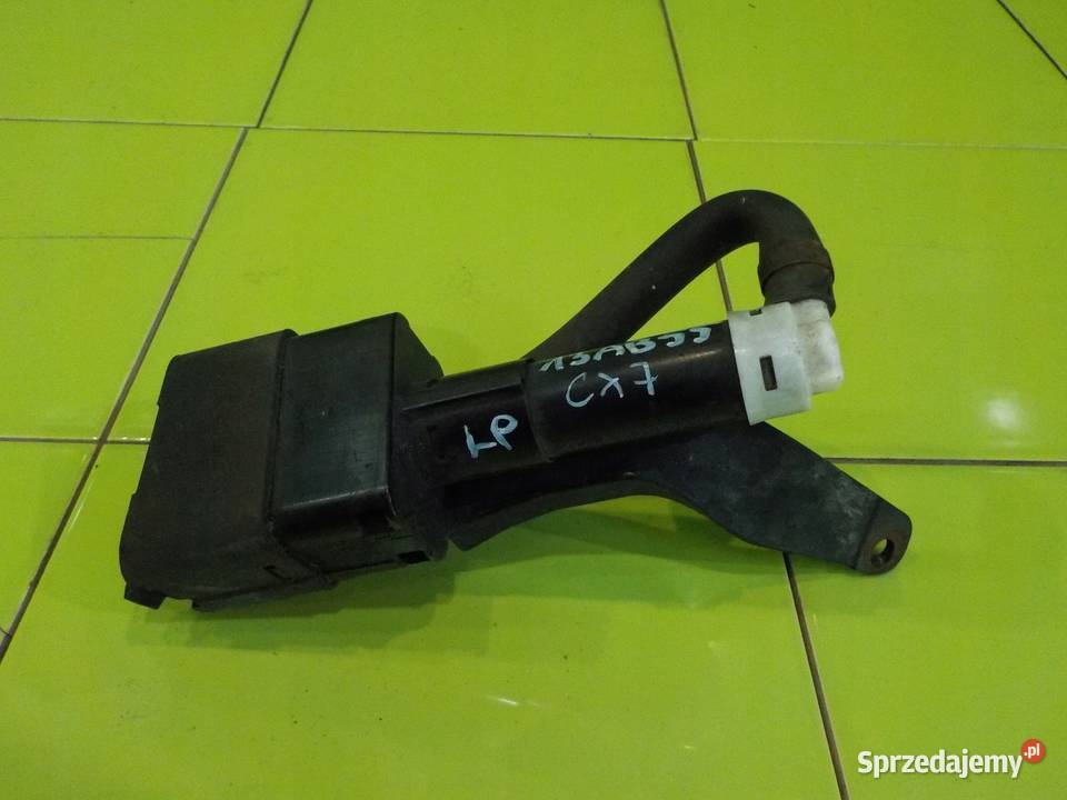 MAZDA CX7 23 T 08r spryskiwacz lampy lewy przod Suków
