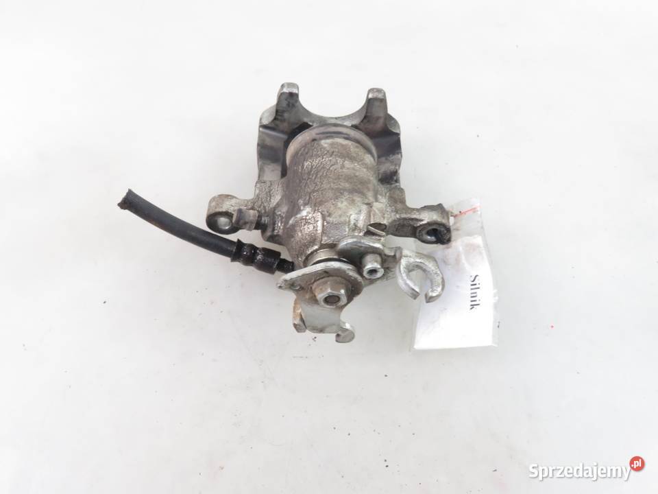 ZACISK LEWY TYŁ VOLVO V40 I