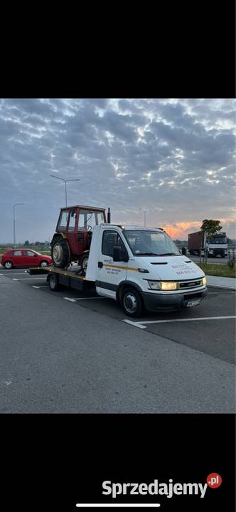pomoc drogowa auto laweta transport maszyn Sulejówek
