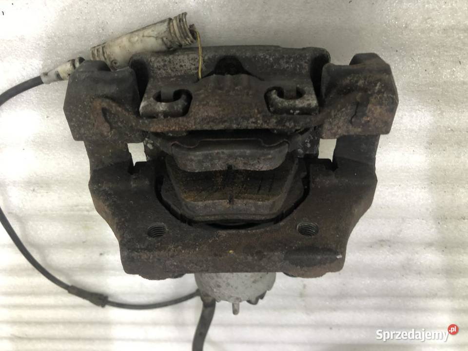 ZACISK HAMULCOWY PRAWY TYŁ BMW E60 osobowe