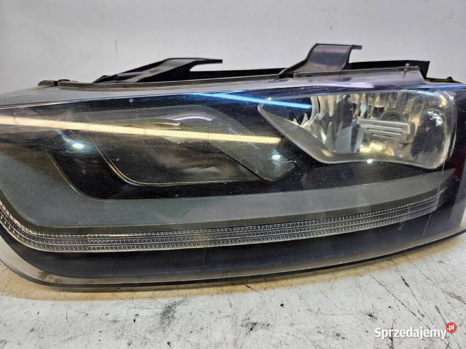 REFLEKTOR LEWY ZWYKŁY AUDI Q3 8U 8U0941003N osobowe Lampy przednie Przystajń sprzedam