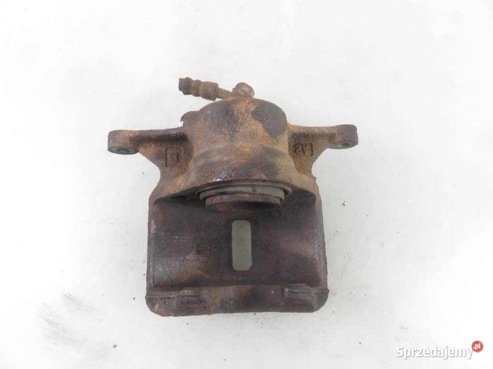 ZACISK LEWY PRZÓD TOYOTA COROLLA VIII E11 20 D4D Zaciski i jarzma