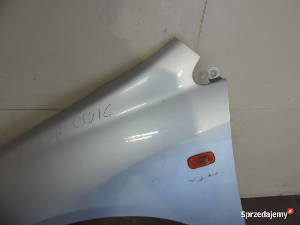 HONDA CIVIC VII BŁOTNIK LEWY PRZÓD NH623M Części samochodowe Nowy Sącz