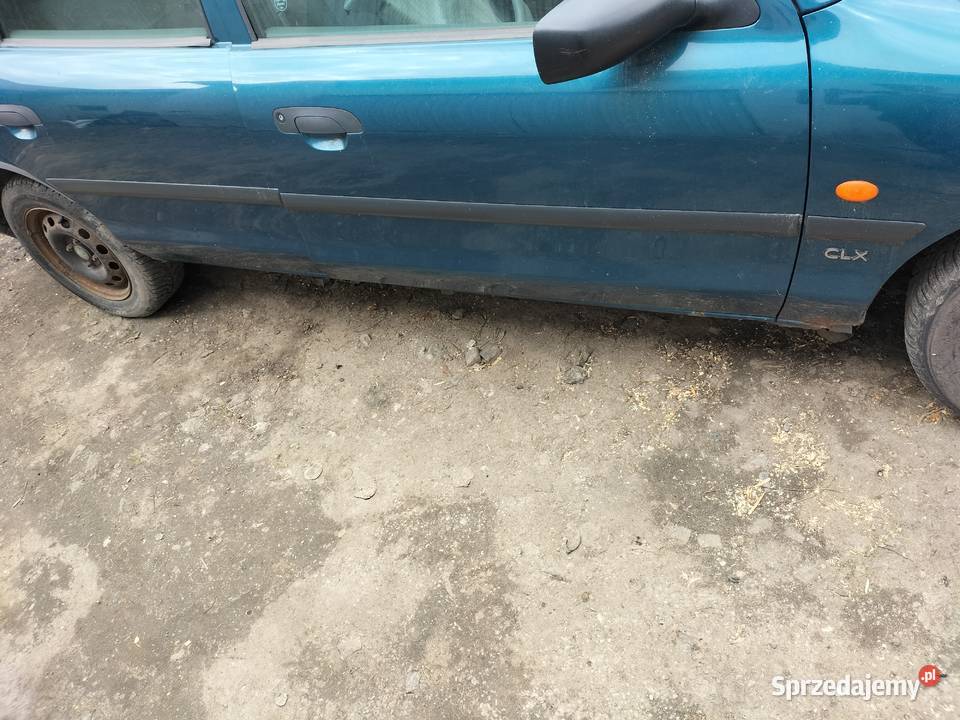 LISTWY LISTWA BOCZNE BŁOTNIKA DRZWI FORD MONDEO