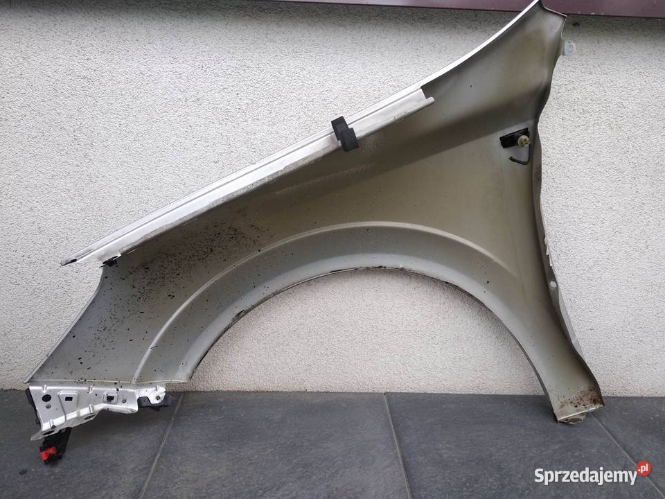 Opel Astra H błotnik przedni prawy srebrny Z157 Błotniki Sieradz