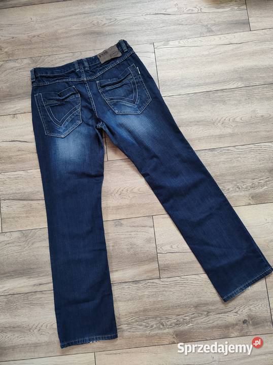 MĘSKIE SPODNIE JEANSOWE niebieski Jasło