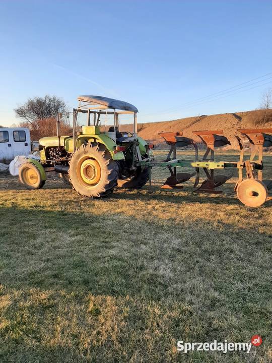 Ursus C4011 z pługiem 3 skibowy obrotowy firmy Kłodzko