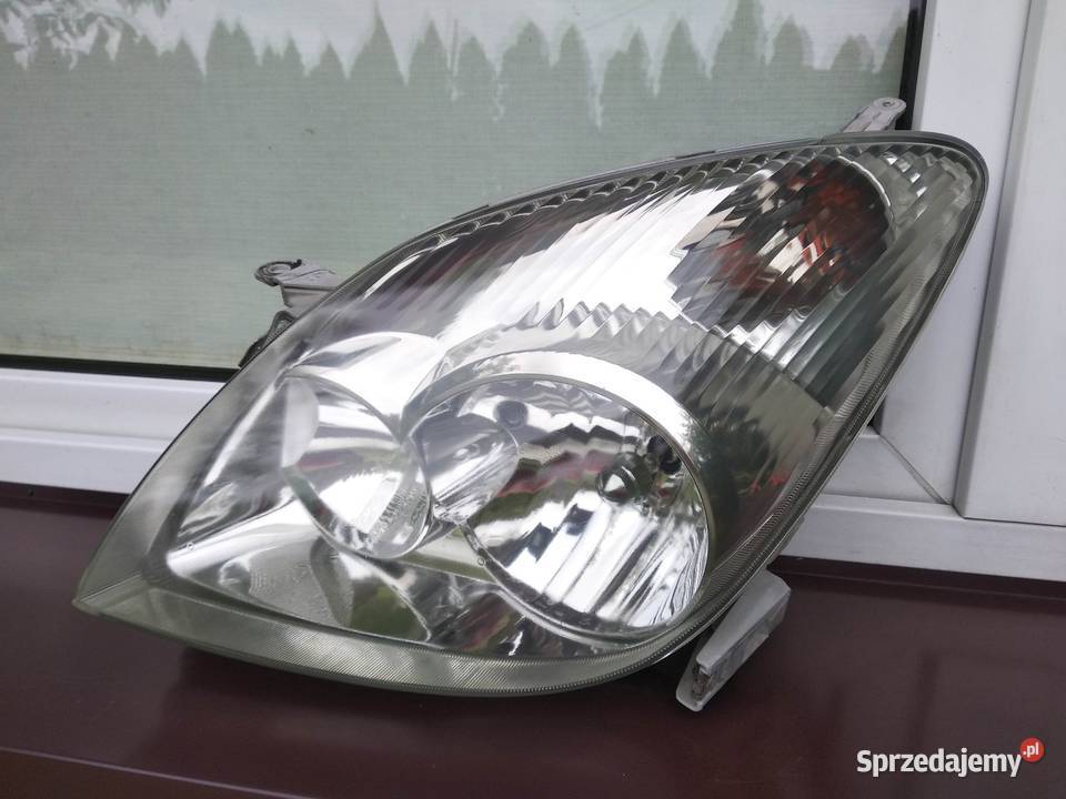 Toyota Corolla Verso I lampa przednia lewa Sieradz