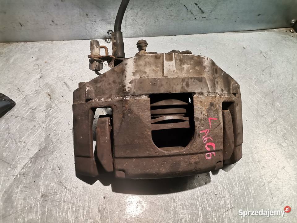 ZACISK 973 LEWY PRZÓD AUDI A4 B6 A6 C5 LIFT POD Nowy Sącz