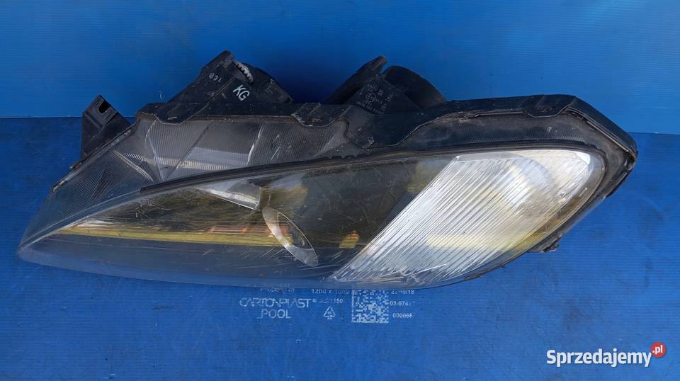 LAMPA LEWY PRZÓD REFLEKTOR EU XENON 10022312 osobowe Nowy Tomyśl sprzedam