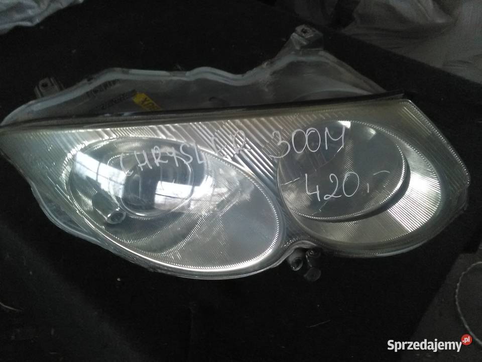 CHRYSLER 300M REFLEKTOR LAMPA PRAWA PRAWY PRZÓD osobowe Choszczno