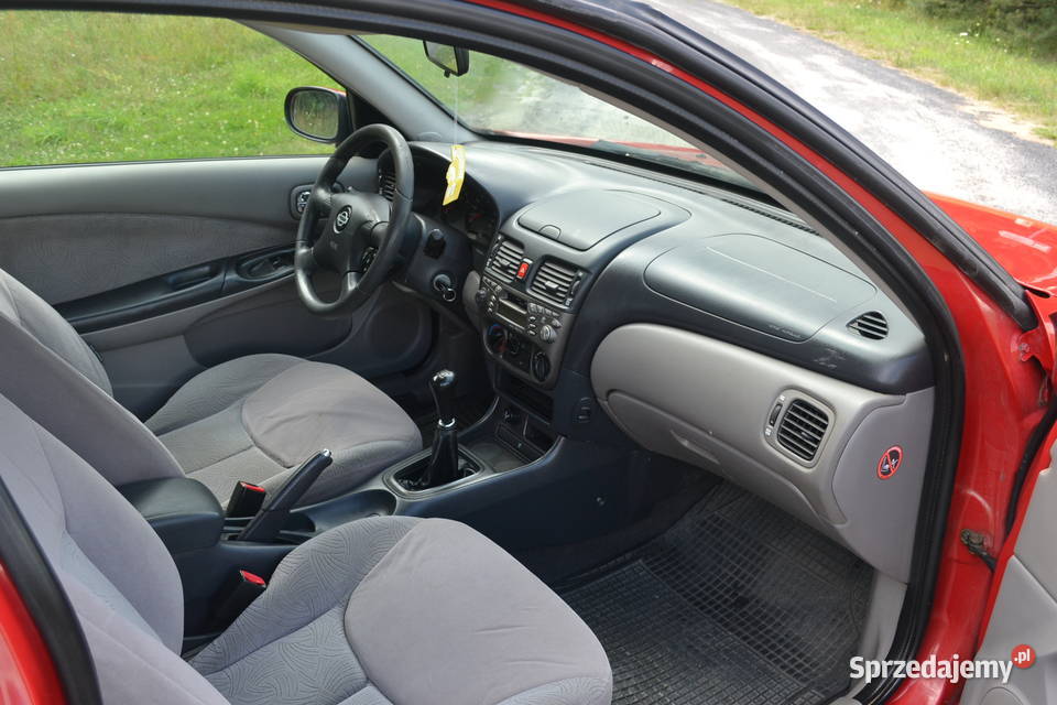 Nissan Almera N16 15 LPG czerwony