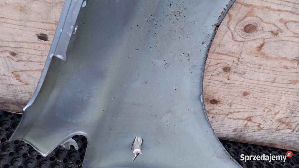 OPEL CORSA D BŁOTNIK PRZÓD LEWY Z163 Zbierkowo